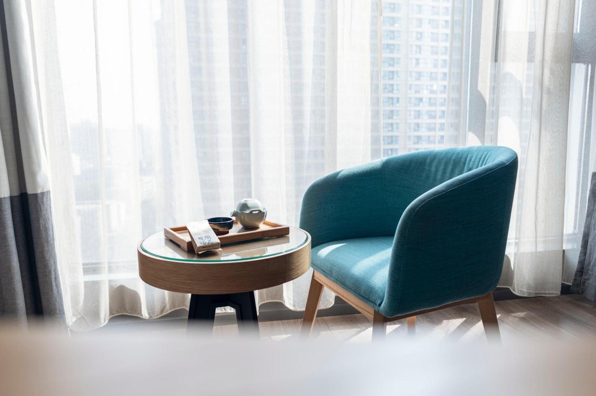 M Hotel Чжэнчжоу Экстерьер фото