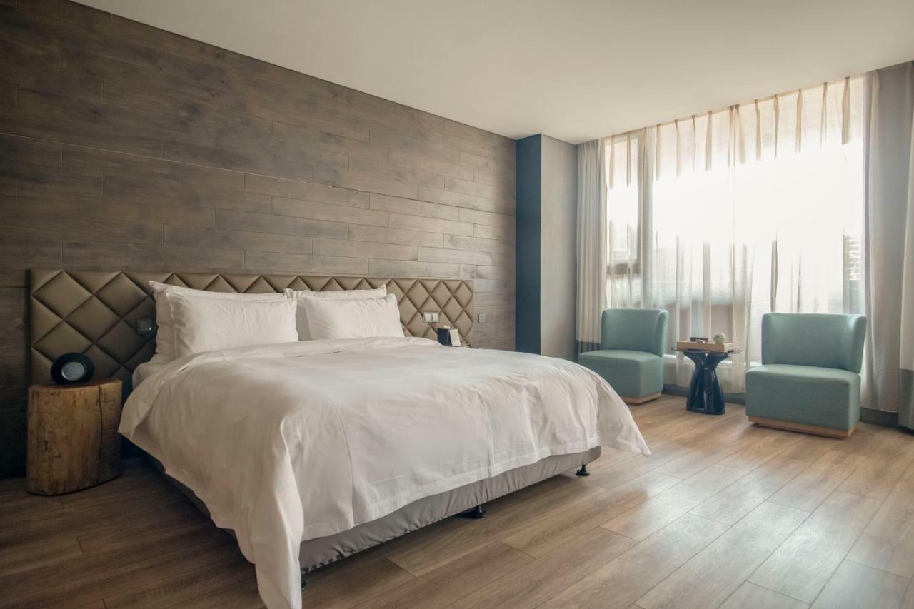 M Hotel Чжэнчжоу Экстерьер фото