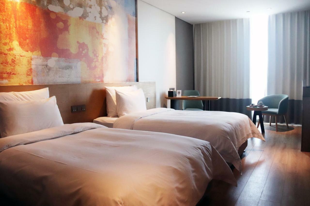 M Hotel Чжэнчжоу Экстерьер фото